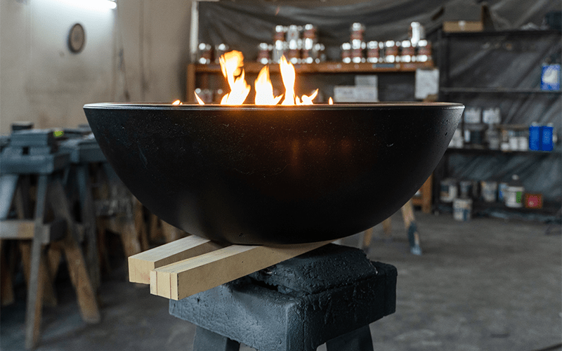 A large fire pit at TNT Group's corporate offices used in production.