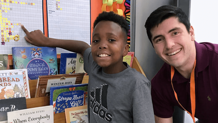 Employee volunteers support students in the classroom.