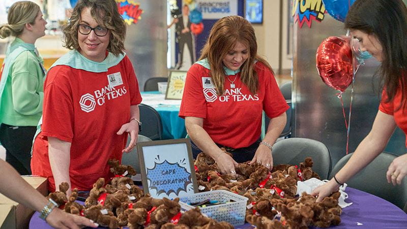 Bank of Texas employees prepare gift bags for patients at Children's Health Medical Center in Dallas.