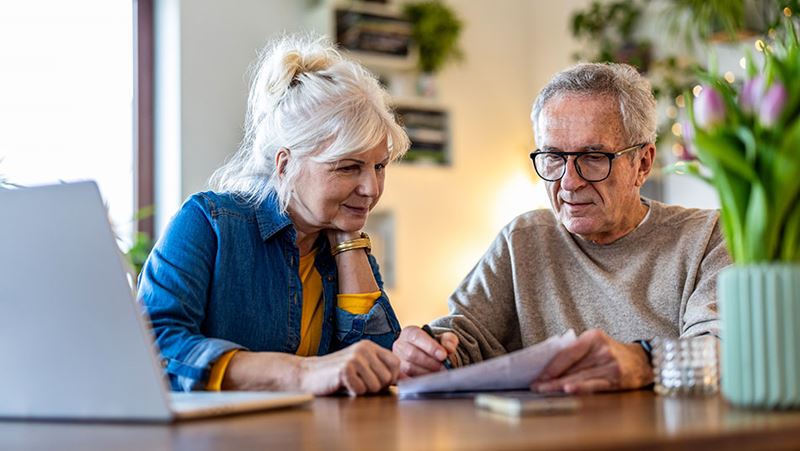 Older couple reviewing finances