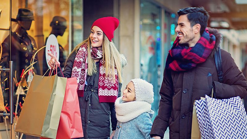 Family doing holiday shopping